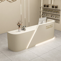Bureau de réception moderne simple en forme de L pour salons de beauté Caissier Magasins de vêtements Établissements de formation Hôtels en MDF durable