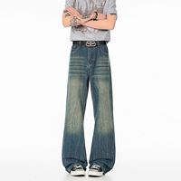 Pantalon ample et respirant pour homme, style américain rétro, en denim délavé et usé, coupe mi-large, design déchiré, style couteau courbé