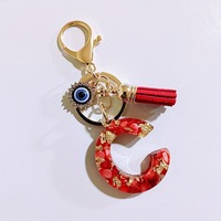 Porte-clés en résine avec initiale A-Z, paillettes dorées, coquille rouge, strass, breloque œil porte-bonheur et pompon rouge, pour femme, cadeau
