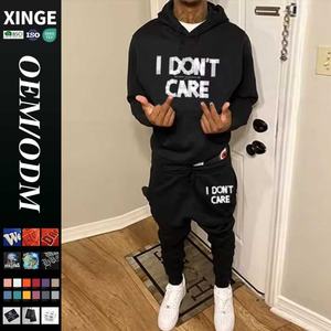 Ensemble de survêtement 2 pièces pour homme avec broderie strass, style streetwear, comprenant un sweat à capuche et un pantalon baggy de jogging - Product Image 1