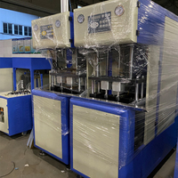 Machine de soufflage semi-automatique pour la fabrication de bouteilles et de pots en plastique pour animaux de compagnie, pour eau et jus