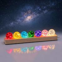 Vente en gros transfrontalière : Ornement décoratif de bureau, petite veilleuse sphérique en cristal coloré effet glace craquelée et ciel étoilé lumineux