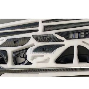 Interior <b>trim</b> for 2016-2021 Toyota Hilux Revo, including dashboard and four-<b>door</b> switch <b>trim</b> panels. - Product Image 2