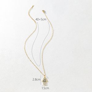 Collana di Lusso con Ciondolo Occhio di Allah, Placcata Oro 14k PVD, in Rame con Zirconi Intarsiati, a Forma di Cuore - Product Image 2