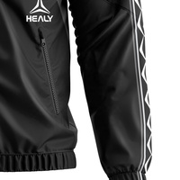 Veste de survêtement noire à col montant et fermeture éclair intégrale au design élégant, coupe-vent performant, résistante à l'eau, avec poches zippées sécurisées