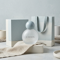 Flacon de parfum en verre vide à bille ronde, design unique et personnalisé, 50ml/100ml, avec pulvérisateur de luxe et boîte