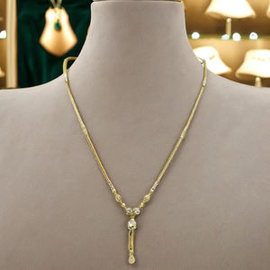 Yellow and White <b>Gold</b> Station dokiyu with Textured Rhodium Accents and Delicate Drop Charm Sophisticated Fine Jewelry - Product Image 3