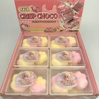 Assortiment de jouets moelleux en forme de chocolat brun, doux et compressibles, en boîte de présentation de douze pièces, pour les boutiques et la vente en gros