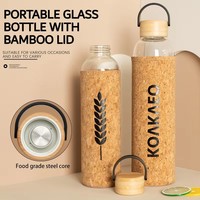 Botol Kaca Borosilikat Tinggi Klasik 550ml/1000ml Tutup Bambu Selubung Gabus Pegangan Baja Tahan Karat Desain Logo Ramah Lingkungan