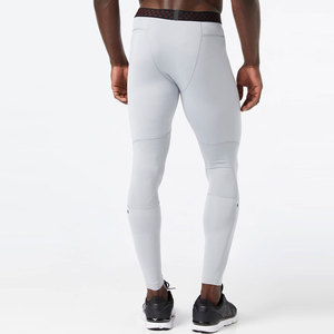 Pantalones de compresión de algodón para hombre con estampado de secado rápido, mallas atléticas para gimnasio, correr y baloncesto, ropa de pierna larga con bolsillos - Product Image 3