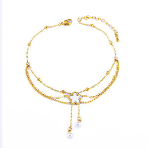 Nouvelle <span class=keywords><strong>Chaîne</strong></span> <span class=keywords><strong>de</strong></span> <span class=keywords><strong>Cheville</strong></span> Femme Tendance en Acier Inoxydable, Coquille Blanche, Fleur à Cinq Feuilles, Pompon et Perle, Triple Couche, Bijoux - Product Image 1
