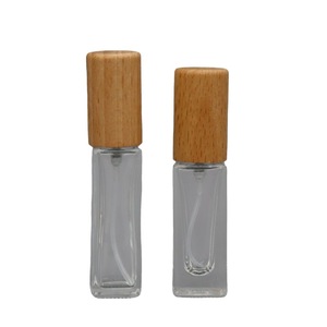 ขวดน้ำหอมแก้วฝ้า 5 มล. แบบพ่นสี่เหลี่ยมผืนผ้า พร้อมฝาไม้ พกพาสะดวก - Product Image 5