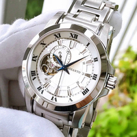 Montre Automatique Squelette Exquise à Cadran Rayé Blanc, Boîtier Poli Argenté, Bracelet Métallique Bleu, Idéale pour le Quotidien