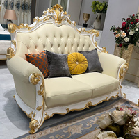 Ensemble de canapés en cuir véritable en bois massif de style européen, luxe haut de gamme, salon, villa, grand appartement, pieds en feuille d'or blanc brillant