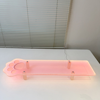 Support d'écran en acrylique élégant et compact de 80x23.5x9cm en forme de patte de chat, avec éclairage intégré, pour une décoration optimisée