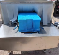 Machine de lavage automatique de type tunnel pour boîtes, palettes en plastique, plateaux à œufs, paniers et caisses