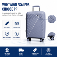 Valise rigide PP grise à roulettes, coque géométrique, poignée latérale, marque privée, assortiment de détail