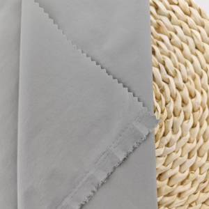 قماش عالي الجودة 88% نايلون 12% سباندكس مقاوم للماء 95 جرام/متر مربع 40D شبه مطفي 146-148 سم قماش نايلون سباندكس مطاطي لسترة واقية من الشمس - Product Image 3