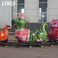 Mignon petit train de dinosaures en métal d'intérieur pour les enfants pour les lieux publics comme les centres commerciaux, les aéroports, les garderies et les jardins d'enfants
