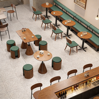 Ensemble de mobilier commercial pour café : table à base conique, tabourets et banquette pour salon de thé et restaurant