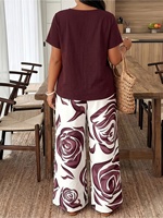 Ensemble décontracté 2 pièces pour femme : haut à col rond et manches courtes de couleur unie avec pantalon large imprimé roses, coupe ample et confortable