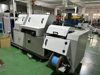 Máquina de encuadernación y punzonadora de bobina espiral de plástico completamente automática