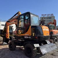 Excavatrice sur pneus Hyundai60 d'occasion, mini-pelle coréenne de 6 tonnes, système hydraulique complet, faible nombre d'heures, livraison rapide, expédition mondiale