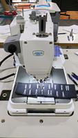 Machine à coudre industrielle informatisée d'occasion JACK JK-9820 pour œillets et boutonnières, avec coupe-fil automatique, pour jeans et costumes