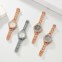 Montre dorée élégante pour femme, cadran en nacre, mouvement à quartz, petite taille, best-seller TikTok en gros direct usine
