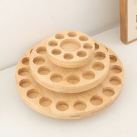 Support de présentation d'huiles essentielles en bambou à 39 compartiments 360 °   Plateau de rangement et de présentation rotatif à trois niveaux pour bouteilles