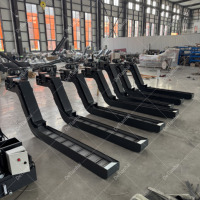 Convoyeur à plaques en acier inoxydable à entraînement motorisé, certifié ISO 9001:2015, d'occasion, à économie d'énergie, type chaîne, réglable