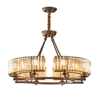 Lustre de luxe vintage en fer marron français à plusieurs têtes, avec cristaux circulaires et hauteur réglable, idéal pour salon, chambre et salle à manger