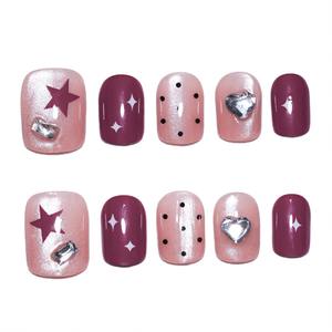 Lot de 10 faux ongles en acrylique pré-dessinés, forme amande, avec motifs œil de chat rose nude, étoiles, cœurs, pois et cristaux noirs - Product Image 5