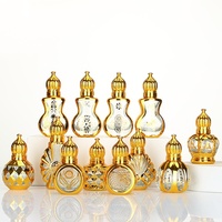 Flacon cylindrique en verre de 10 ml avec bille roll-on pour huiles essentielles, parfums et huile de sésame arabe, de luxe, rechargeable, avec finition dorée et finition mate givrée