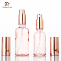 Vente en gros de flacons pulvérisateurs en verre pour huiles essentielles, 15 ml, 30 ml, 50 ml, 100 ml, couleur rouge rose, atomiseur fin, avec bouchon doré rose