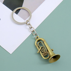 Nuevo diseño de simulación de Metal, instrumento Musical 3D, trompeta, saxofón, llaveros, colgante, llavero Musical de moda, regalo de recuerdo - Product Image 5