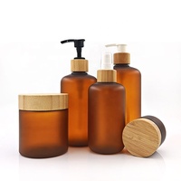 Botol Gel Mandi Bulat Amber Matte Plastik PET Kosong dengan Pompa Lotion untuk Serum Perawatan Kulit & Sampo