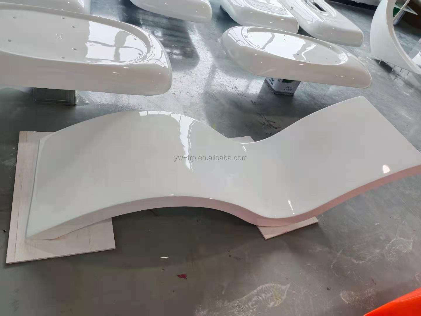 White sun chair on the ground