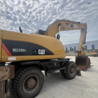 Excavatrice sur pneus CAT M320D d'occasion, 20 tonnes, Caterpillar M320D, à vendre