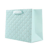 Sacs cadeaux en papier matelassé pastel imprimés offset avec poignées en ruban pour les faveurs de mariage et les projets d'artisanat