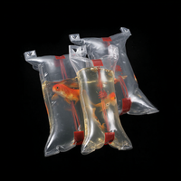 Sac en plastique transparent gonflable thermoscellable portable en stock pour le transport et l'expédition de poissons vivants et de fruits de mer