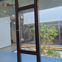 Ventana Abatible y Giratoria de Aluminio con Rotura de Puente Térmico, Franja Decorativa Naranja, Apertura Interior