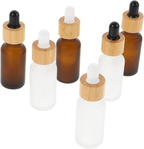 Hot Sale Multi-Size Frosted Matte Amber Cylinder Glass <b>Dropper</b> <b>Bottle</b> with Bamboo Lid for Skin Care Serum & Eye Drop - Product Image 1