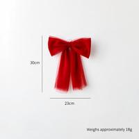 Grand nœud en tulle rouge pour le sommet de l'arbre de Noël, idéal pour les vitrines et la décoration festive