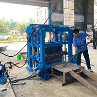 Machine automatique hydraulique LONTA QTJ4-35A pour la fabrication de blocs de pavés creux autobloquants en ciment et béton, briqueterie