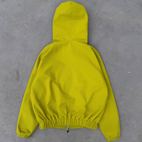 Blouson bomber à capuche jaune vif, coupe oversize, tissu texturé, streetwear 2025, personnalisable OEM/ODM, faible MOQ pour les marques de mode