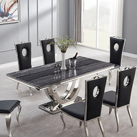 Ensemble de table à manger rectangulaire contemporaine Fanaosi 6 places avec chaises, pieds en acier inoxydable et plateau en marbre pour la maison ou la villa
