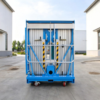 Plateforme de travail aérienne mobile hydraulique à double mât en aluminium avec pieds stabilisateurs pour l'installation de luminaires de plafond en centre commercial