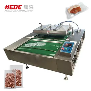 Animal feed meat sausage rice whole chicken chocolate cheese dates fish conveyor rolling belt continuous vacuum packing machine