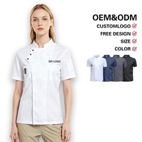 Nouvelle tenue de chef d'été transfrontalière à trois boutons, avec patte de boutonnage asymétrique, anti-humidité, 100 % polyester, avec motif en relief